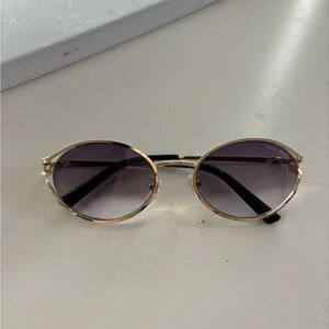 Gold Frame Sunglasses with Black Arms